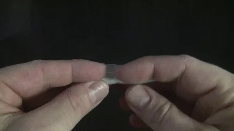 Rolling a cigarette or joint. Stock Footage 99613439