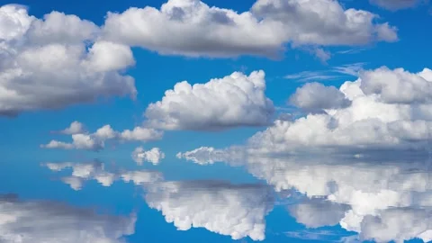 Rolling cloud water reflection Stock Footage 260404372
