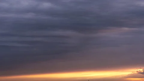 Rolling cloud waves, running from afar towards Stock-Footage 144637059