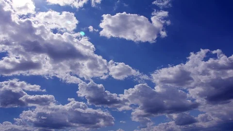 Rolling clouds in the blue sky, time lapse 4K video Stock Footage 104080073