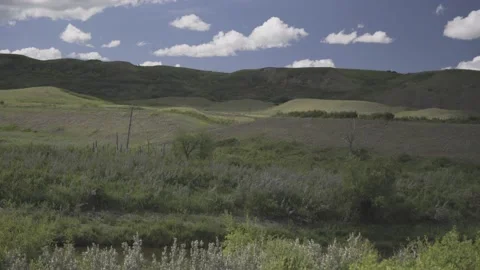 Rolling Clouds on Hills Stock Footage