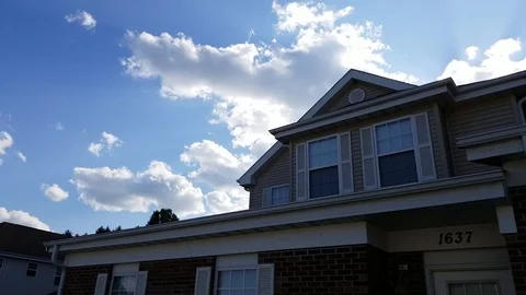 Rolling clouds in neighborhood Stock Footage 94493713