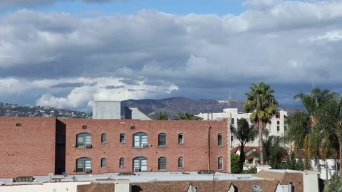 Rolling Clouds over Hollywood Sign Stock Footage 73871726
