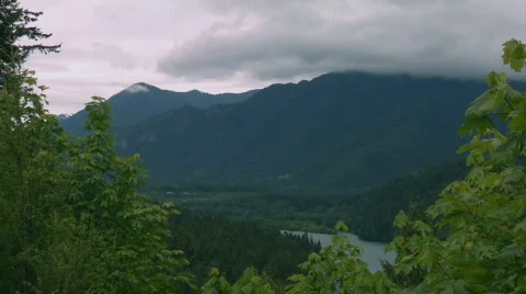 Rolling Clouds over Mountaintops Stock Footage 138304