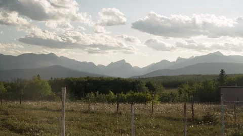Rolling Clouds Sunset Time lapse over Many Glacier Valley, HD 動画素材 129608306
