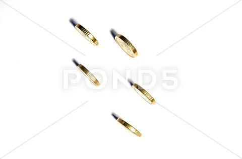 Rolling coins Stock Photos