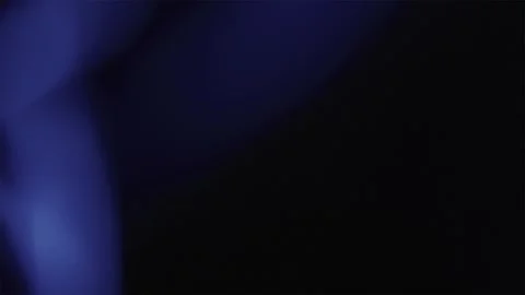 Rolling colored flashes on a dark background Stock Footage 252206933