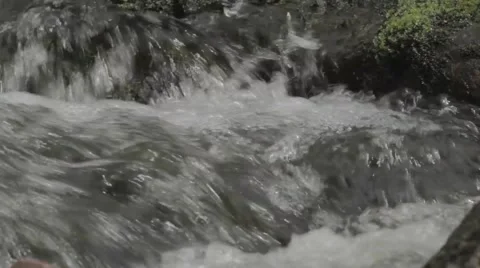 Rolling creek going down to a waterfall Stock Footage 40016774