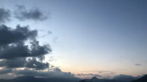 Rolling cumulus clouds colorful timelapse Stock Footage 154253725