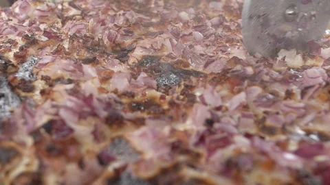 Rolling cutter cuting up the steaming pizza, slow motion, stock video Stock Footage 102506087