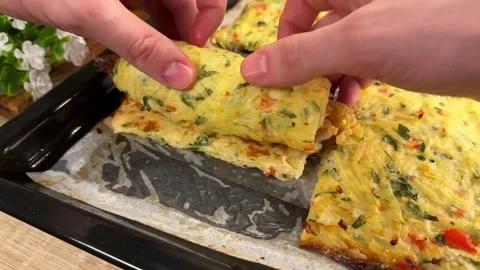 Rolling a delicious potato crust with chicken and bell pepper filling for a meal Stock Footage 325072063