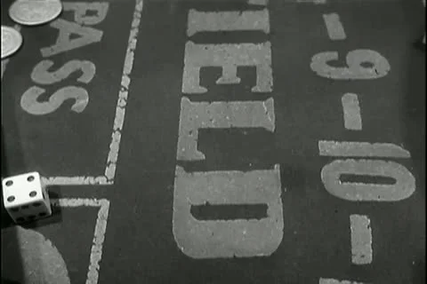 Rolling dice on craps table Stock Footage 11346856