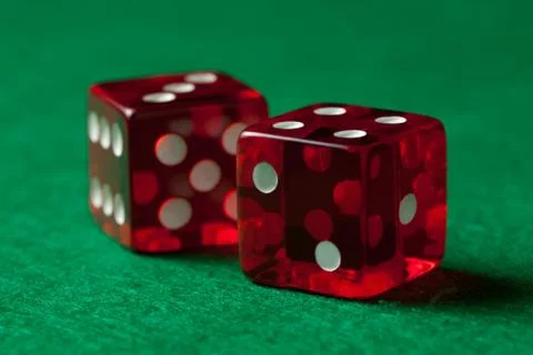 Rolling dice Stock Photos