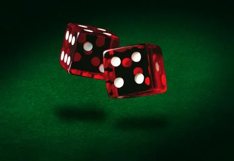 Rolling dice Stock Photos