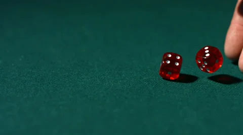 Rolling dice in slow motion Stock Footage