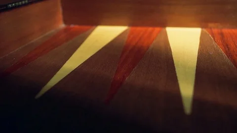 Rolling die, throwing die, playing backgammon board game Stock Footage 128188659