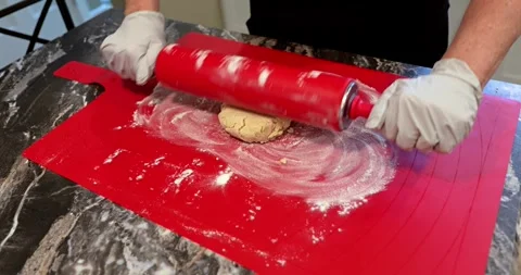 Rolling dough and forming the crust in a pie tin. Stock Footage 266071236