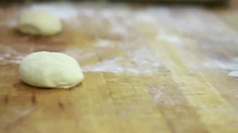 Rolling dough balls 2 Stock Footage 9441303