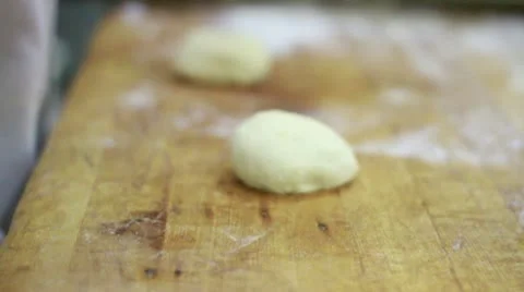 Rolling dough balls 3 Stock Footage 9441124