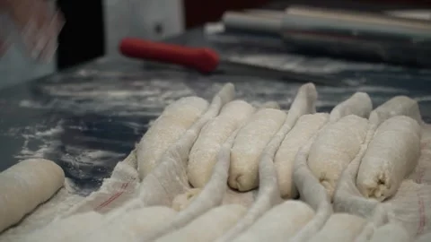 Rolling Dough for Bread Stock Footage 317472622