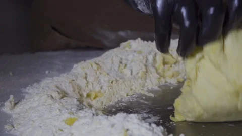 Rolling dough for bread in slow motion Stock Footage 127855288