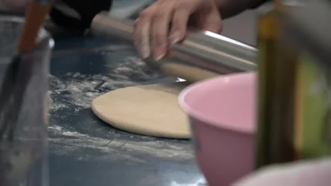 Rolling Dough in the Kitchen Stock Footage 317472559