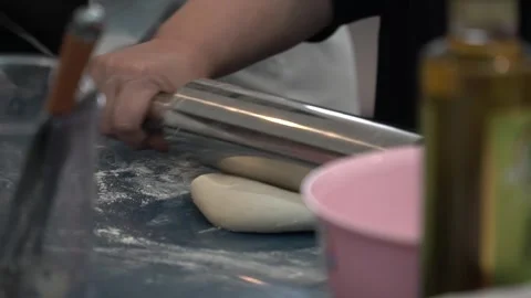 Rolling Dough in Kitchen Stock Footage 317472560