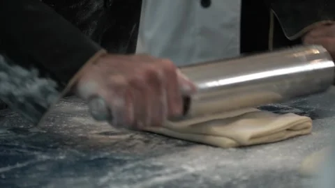 Rolling Dough in a Kitchen Stock Footage 317472639