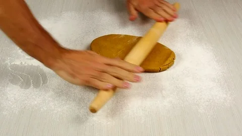 Rolling dough. Making Christmas Gingerbread Cookies. Stock Footage 77224982