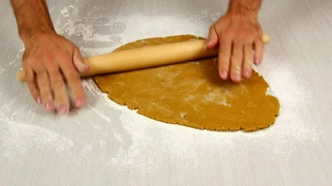 Rolling dough. Making Christmas Gingerbread Cookies. Stock Footage 77225097