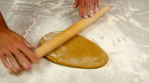 Rolling dough. Making Christmas Gingerbread Cookies. Stock Footage 77225832