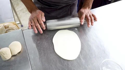 Rolling dough for naan 動画素材 309947419