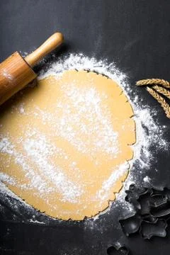 Rolling dough with roller Stock Photos