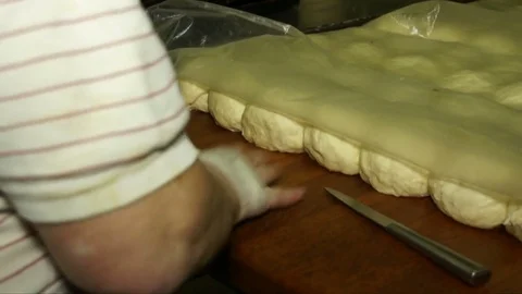 Rolling the dough into a rope hands Stock Footage 71815986