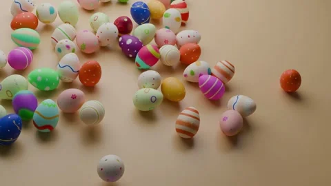 Rolling easter eggs - colorful 3d animation 4K 30p video Stock Footage 304459230