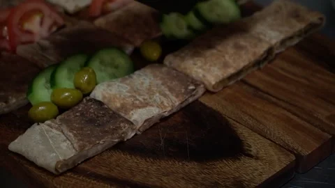 Rolling Flatbread with Fresh Vegetables Stock Footage 319951190