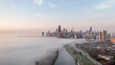 Rolling Fog Engulfs the Chicago Skyline in Aerial Hyperlapse Stock Footage 344972737
