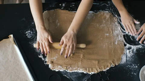 Rolling ginger cookie dough, view from above Stock Footage 321953054