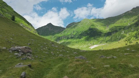 Rolling Grassland Below Rocky Carpathian Crest Stock Footage 343724936