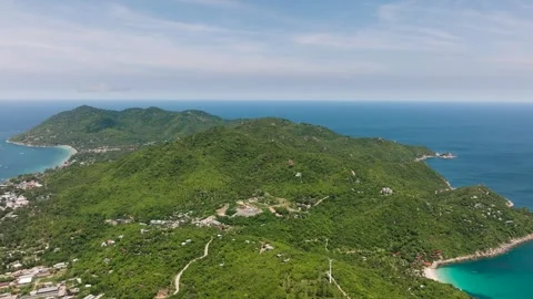 Rolling green hills and deep blue ocean horizon. Koh Tao, Thailand. Stock Footage 301157392