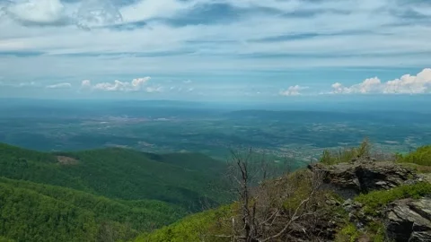 Rolling green hills stretch beneath a vast. Jastrebac Mountain, Serbia. Vídeo Stock 336024496