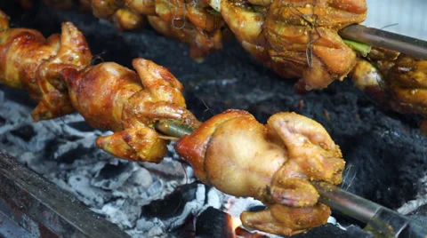 Rolling Grilled Chicken On Cooking Machine With Herbal Charcoal Video stock 34461395