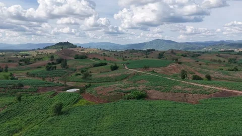 Rolling Hills and Gathering Clouds in Peaceful Rural Area Stock Footage 310883489
