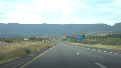 Rolling hills and sparse vegetation in a desert setting in Arizona in slow .. Stock-Footage 285080708