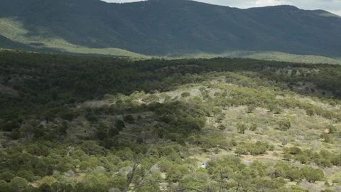 Rolling hills with cloudy skies Stock Footage 104877758