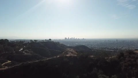 Rolling Hills with a Distant Cityscape Stock Footage 300865073