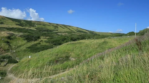 Rolling hills path and countryside Stock Footage 40701609