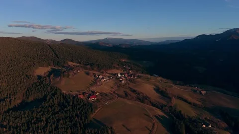 Rolling hills under clear blue sky Stock Footage 329405725