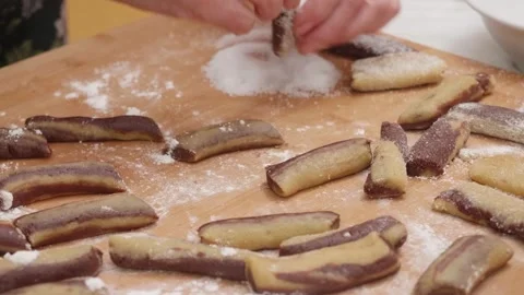 Rolling homemade cookies in sugar before baking Stock Footage 320068340