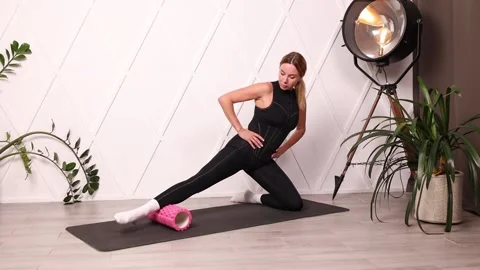 Rolling the inner calves with a roller Video stock 280160356